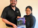 ARRL Emergency Preparedness Manager Mike Corey KI1U, presents the 2017 Leonard Award for Audio Reporting to Arwa Gunja, executive producer of “The Takeaway,” and to the show’s staff. “The Takeaway” was honored for its coverage of ARRL’s role in supporting the American Red Cross in the response to Hurricane Maria and its impact on Puerto Rico. [Tanzina Vega photo] 